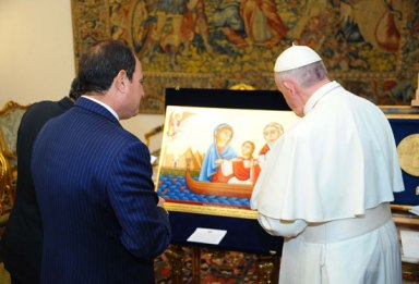 President El-Sisi delivers a gift to the pope of the Vatican, pope Francis, consisting of a picture showing the sacred family's journey in Egypt.
