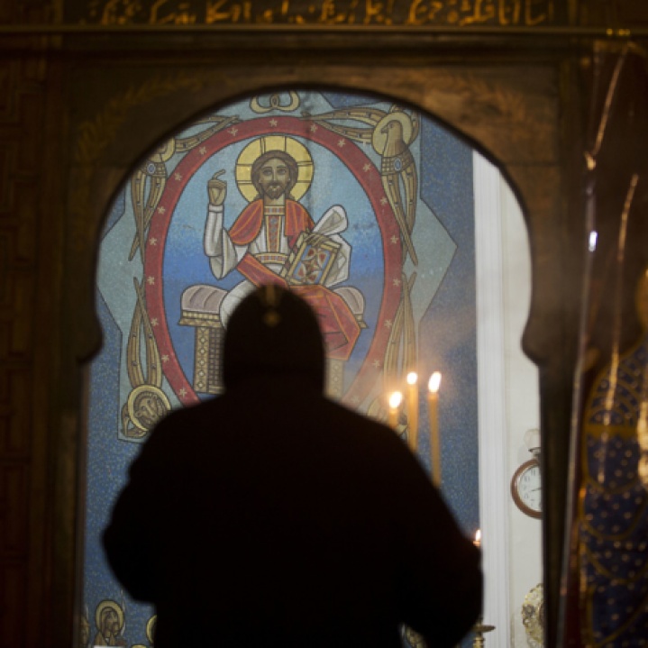 2018-01-21 Praying next to the art at Nativity of Christ Coptic Orthodox Church in Cairo AlAhram